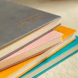 Блокнот Deli EN135LORANGE A5 210х143мм искусст. кожа 80л линейка мягкая обложка оранжевый