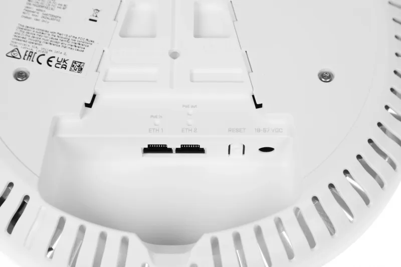 Точка доступа MikroTik RouterBOARD cAPGi-5HaxD2HaxD, cAP ax 802.11a/b/g/n/ac/ax, 2x Gigabit Ethernet with PoE IN and Out support, Power supply via DC jack and PoE 18 - 57V DC, 802.3af/at