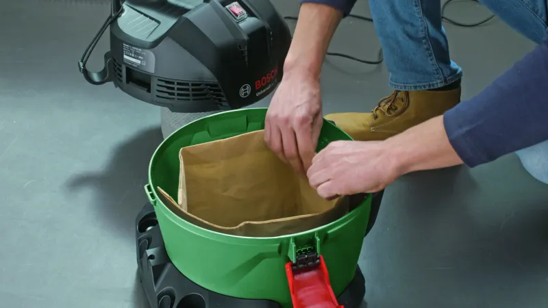 Строительный пылесос Bosch UniversalVac15 1000Вт (уборка: сухая/влажная) зеленый